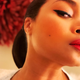 A red statement lip and a cateye? Instant classic.